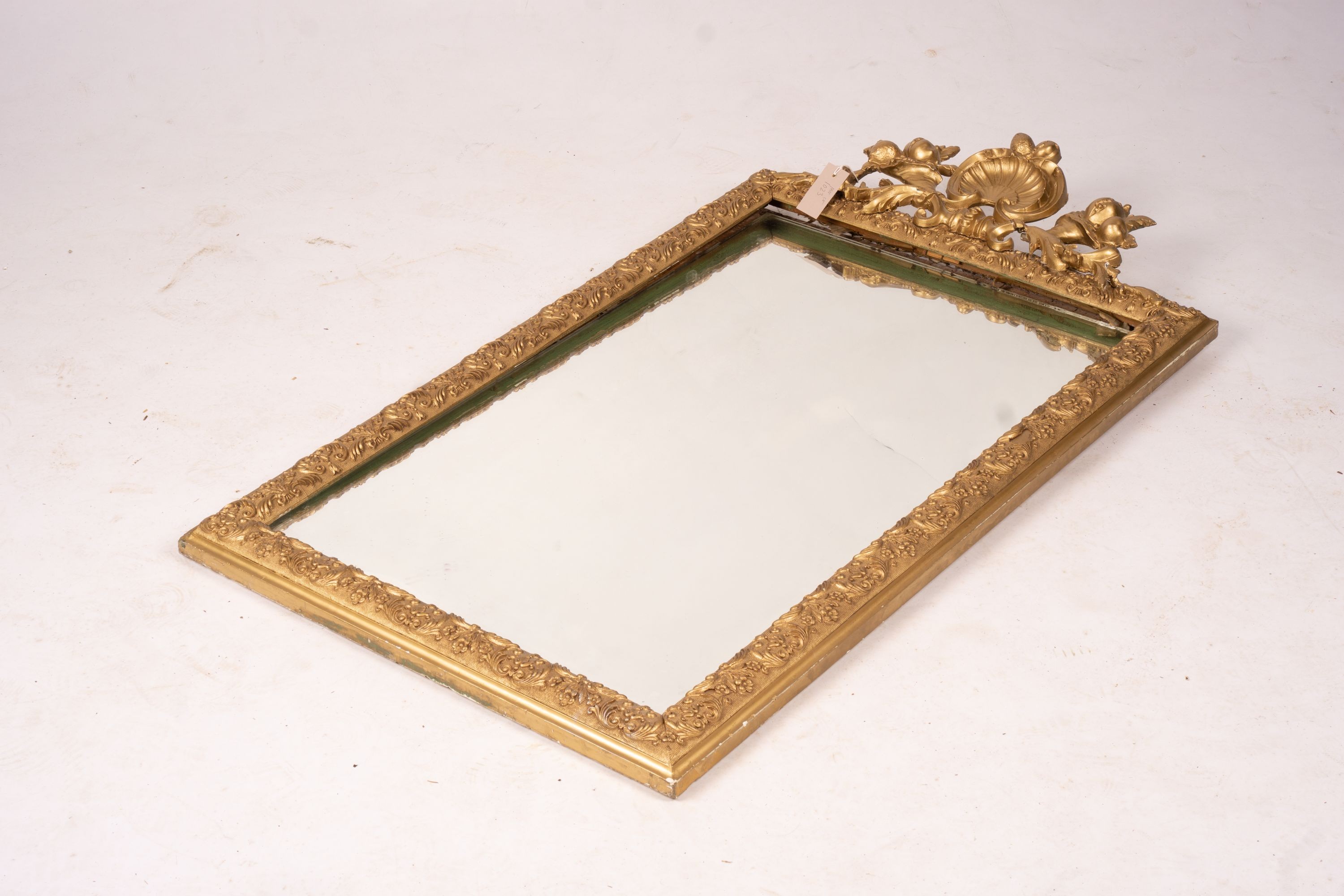 A 19th century French gilt gesso wall mirror, width 64cm, height 116cm together with a modern larger rectangular wall mirror